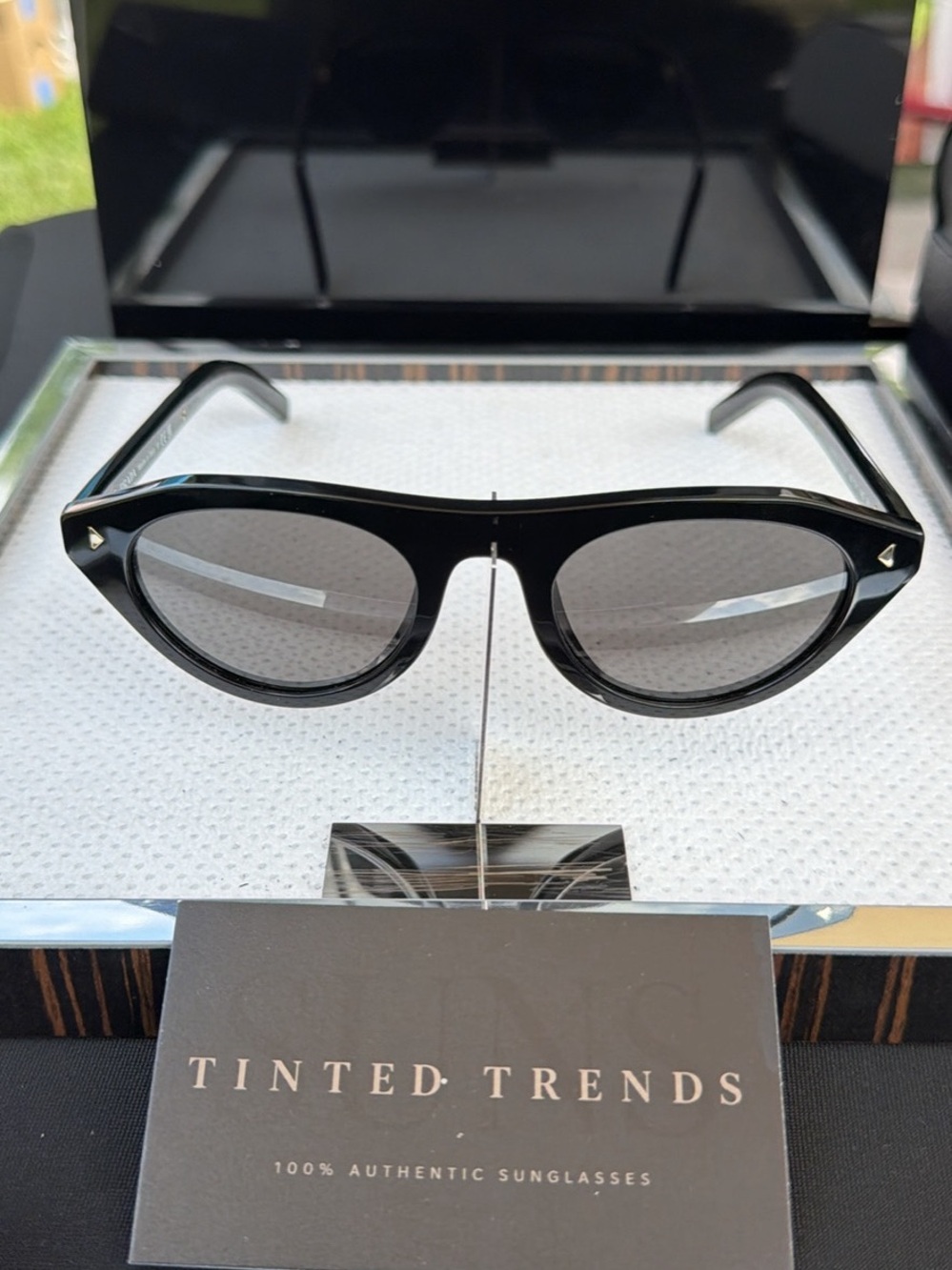 Prada Black Round-Edge Sunglasses with Gray Lenses